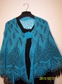 &quot;Papyrifera&quot; shawl front view on a hanger.