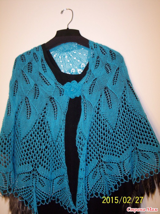 &quot;Papyrifera&quot; shawl front view on a hanger.