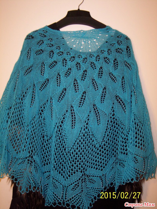 &quot;Papyrifera&quot; shawl back view on a hanger.